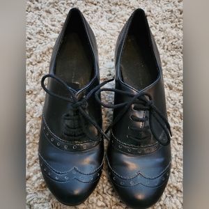 Black leather lace up shoes with heel. Size 7